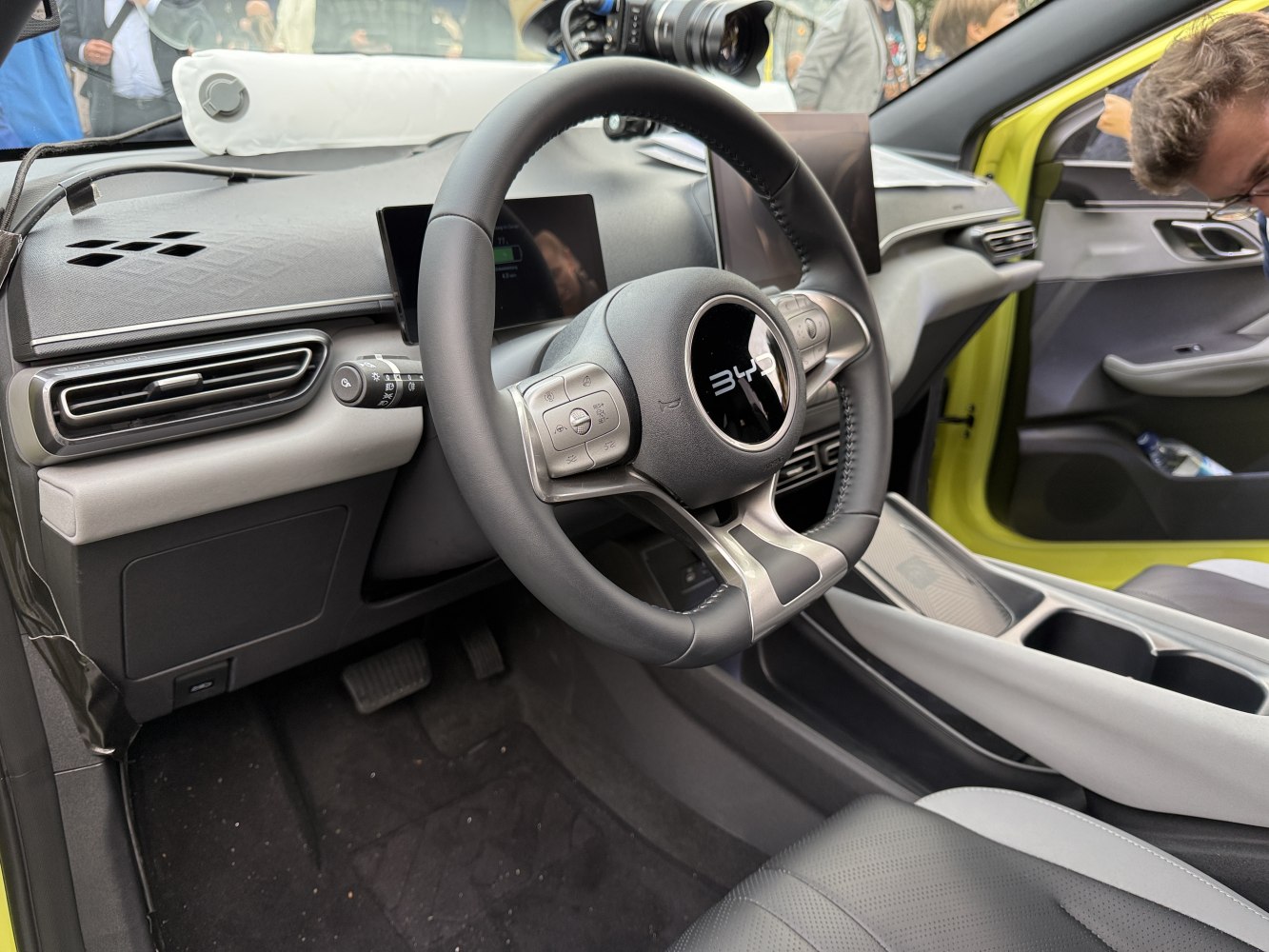 Modern car interior with advanced steering wheel and digital dashboard