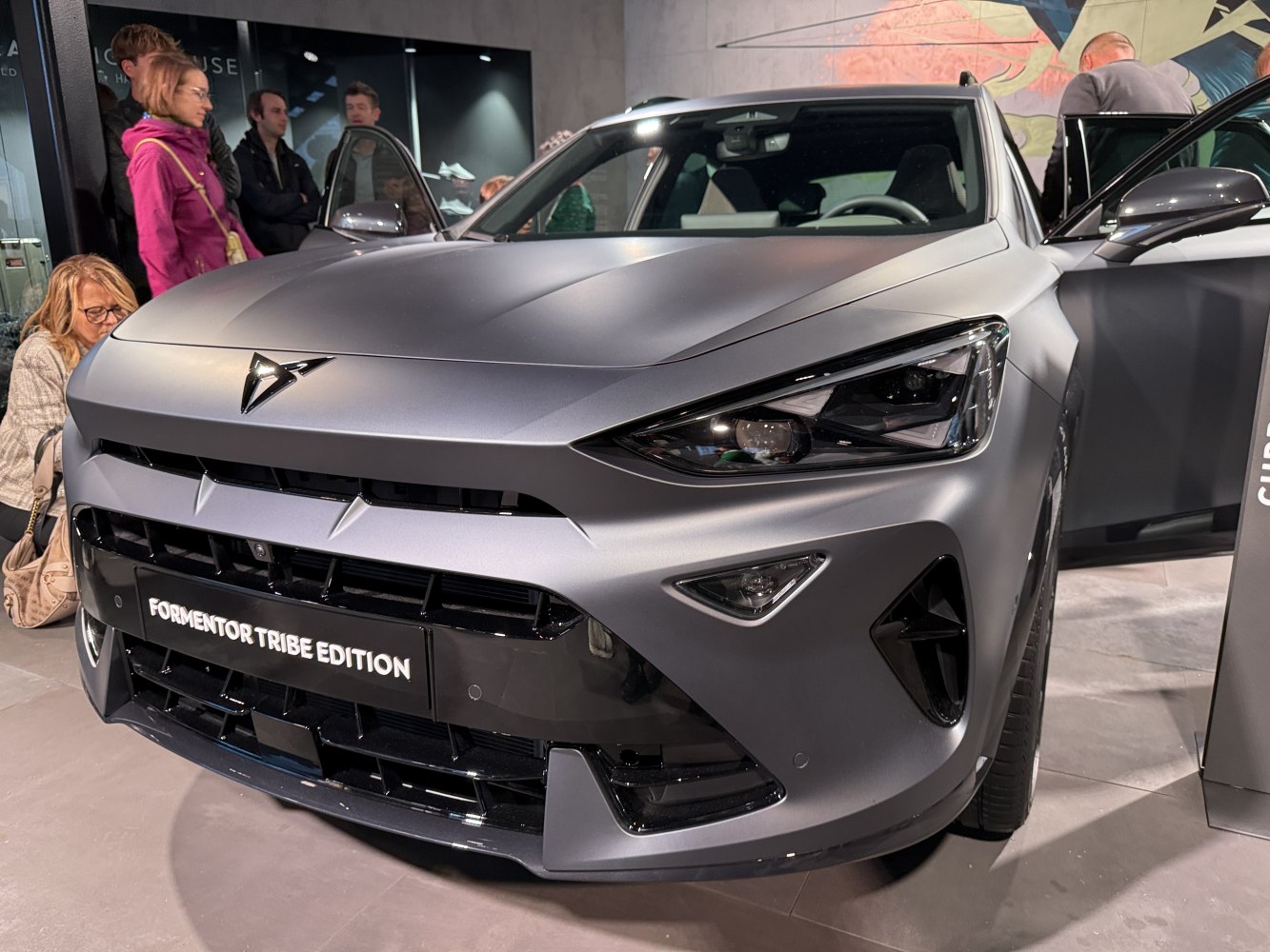 Front grille and sharp headlight design of a modern SUV