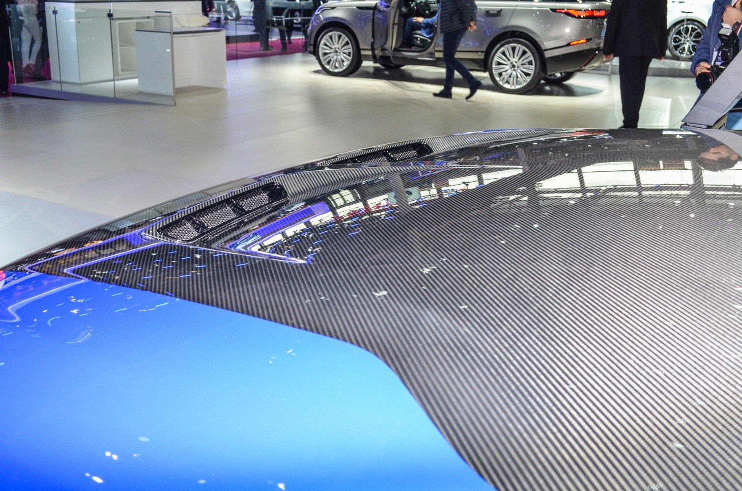Carbon fiber hood with ventilation vents on a performance SUV