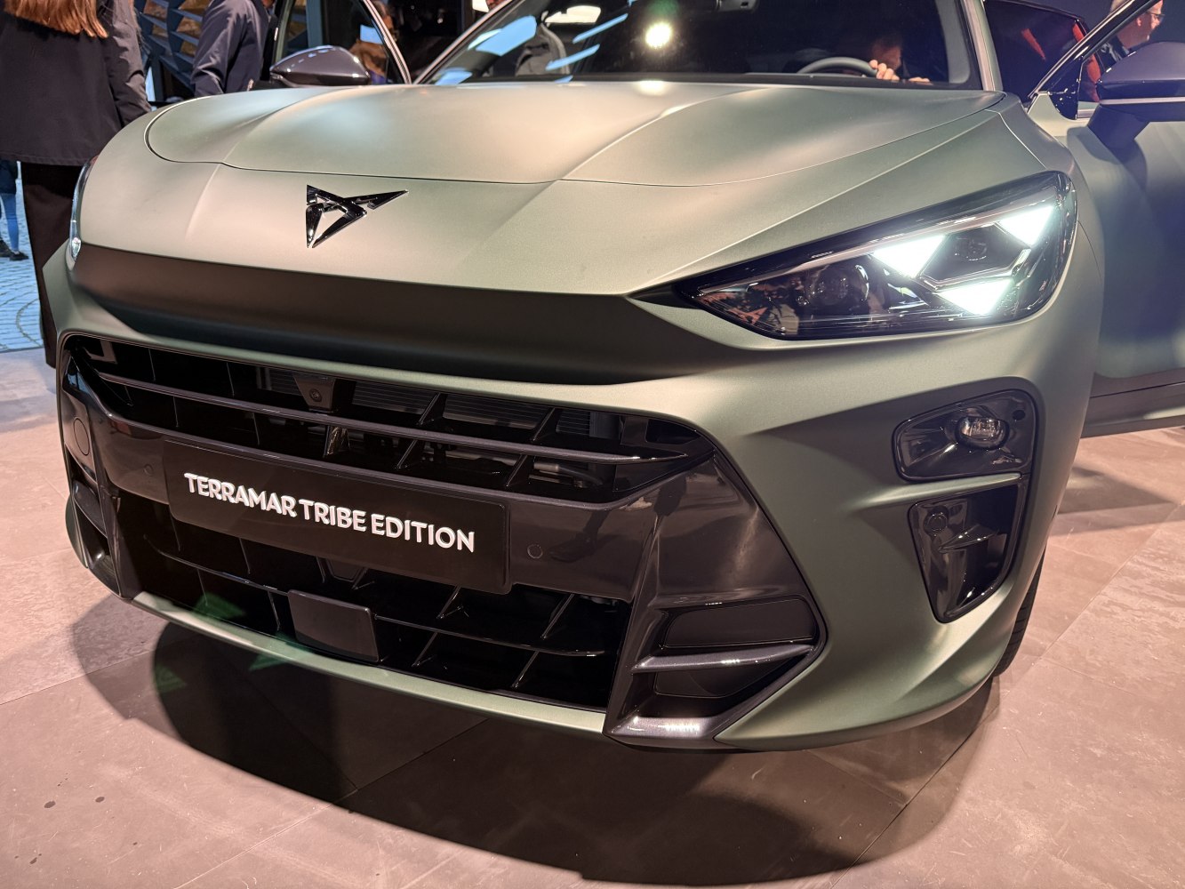 Front view with LED headlights and bold grille