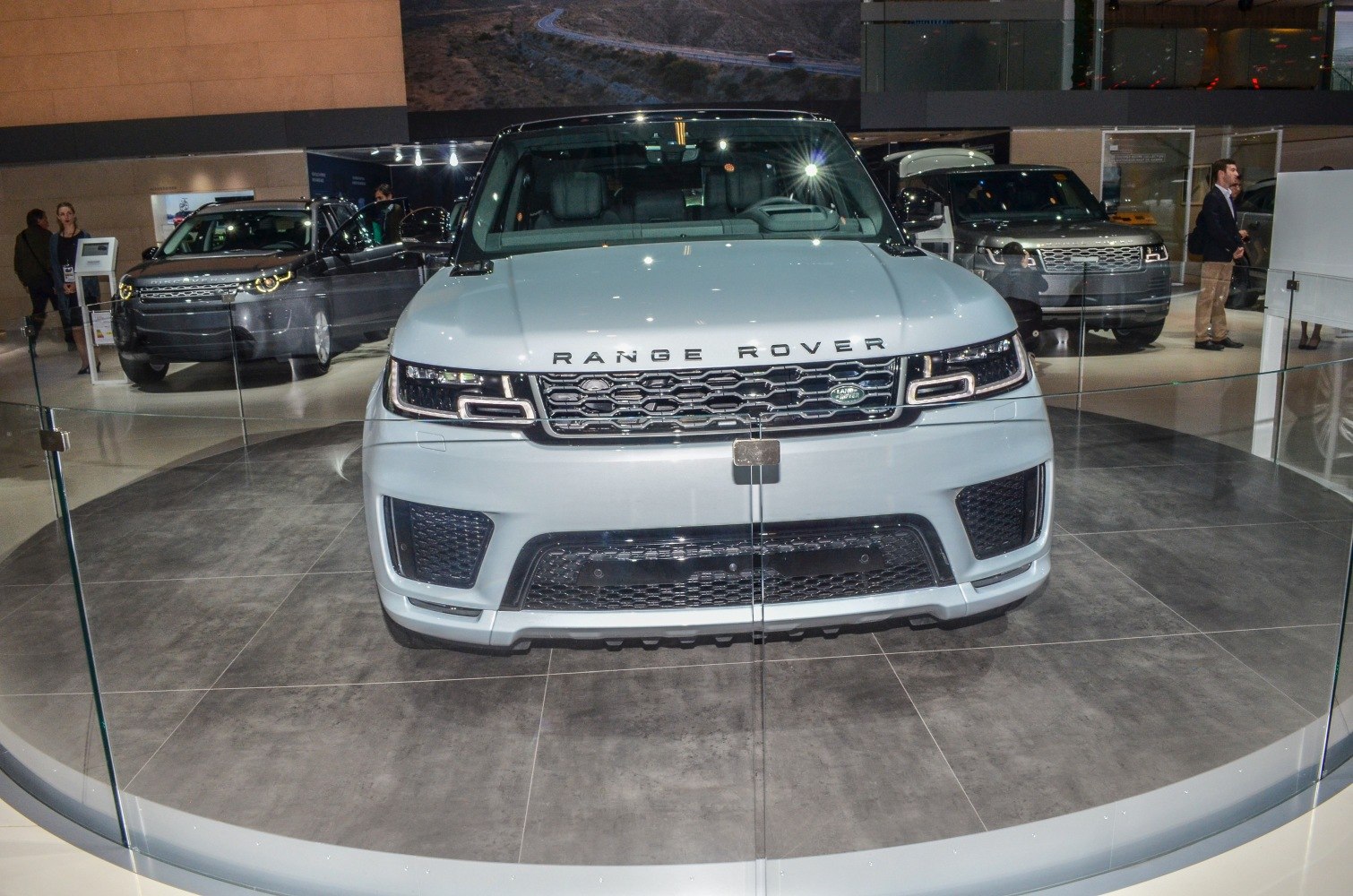 Front grille and LED headlights of a modern luxury SUV.