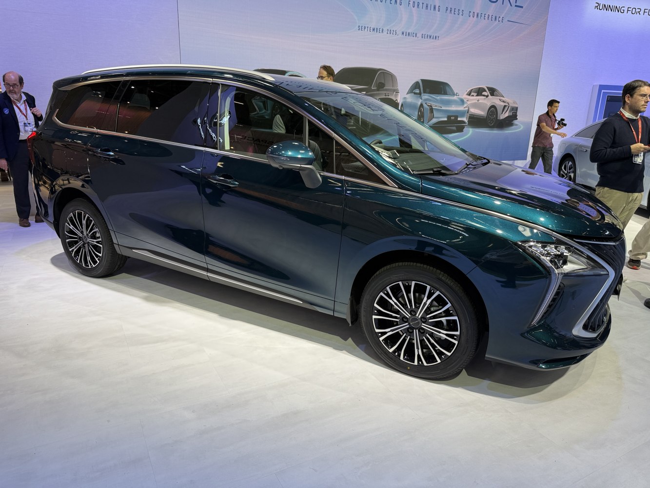 Side view of modern MPV with distinctive front design and alloy wheels