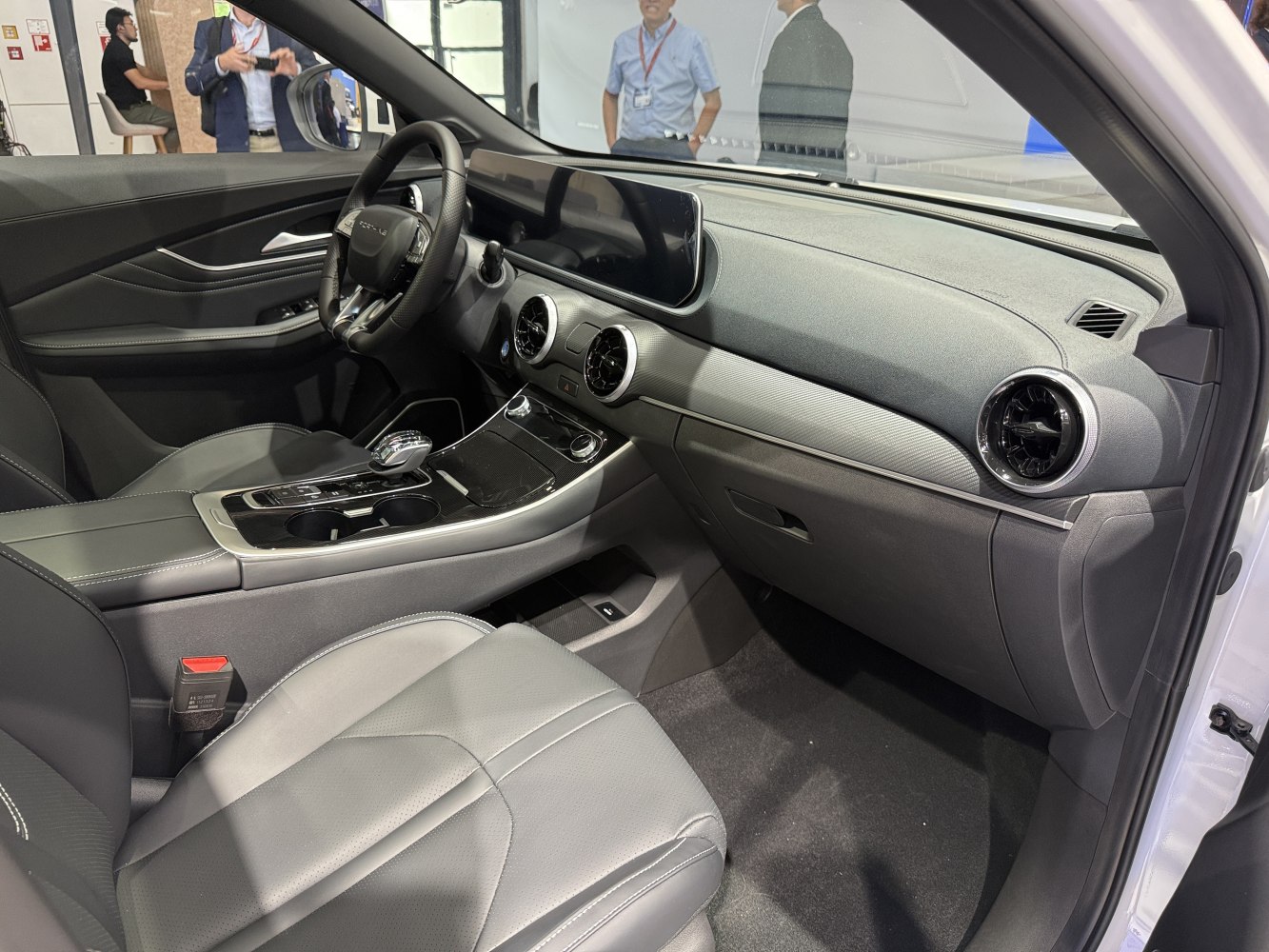Modern car interior with digital dashboard and sleek central console