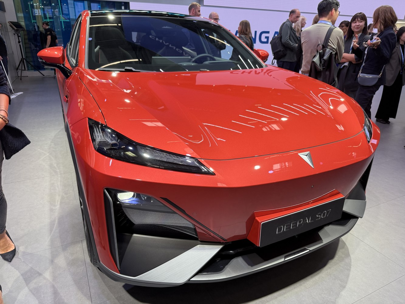 Sleek car front with sharp headlights and aerodynamic design