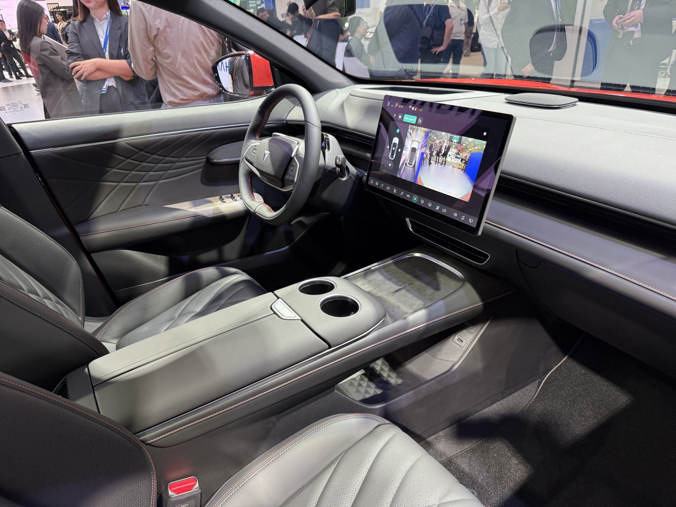 Modern car interior with large touchscreen and minimalist dashboard