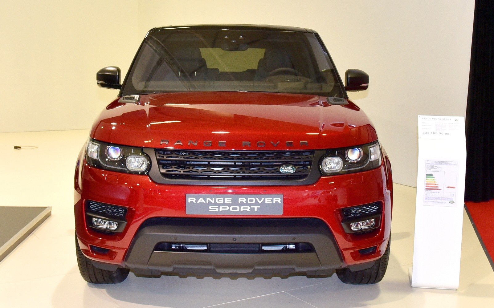 Front view with signature grille and dual headlights.