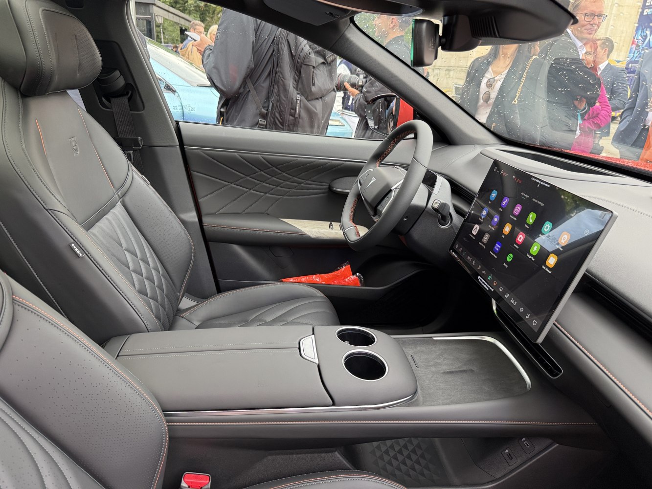 Premium leather seats and large touchscreen display inside car interior