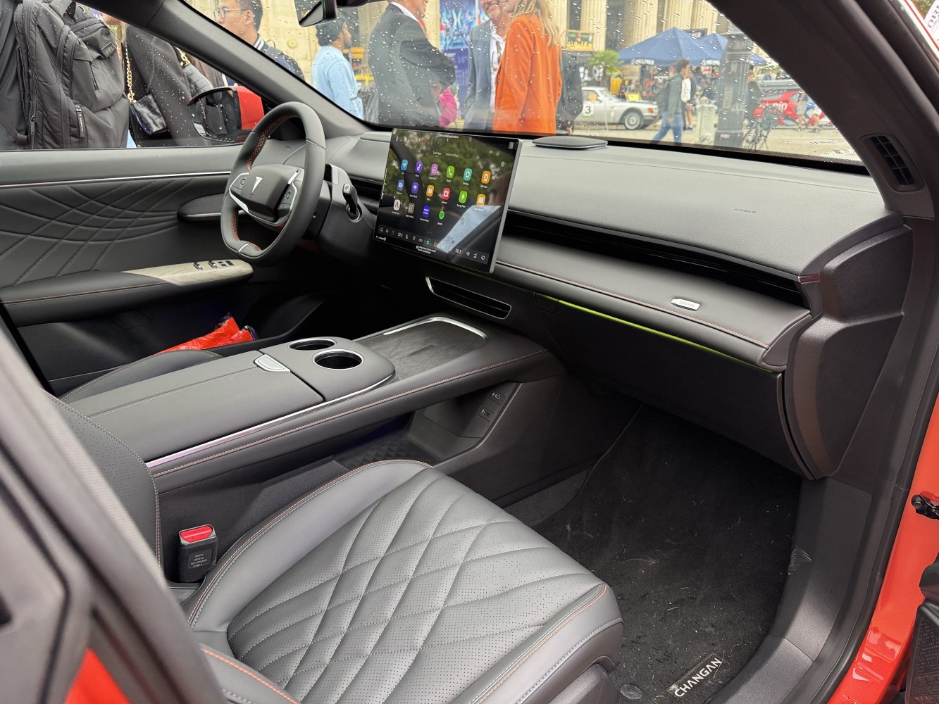 Digital dashboard and quilted leather seats in car interior