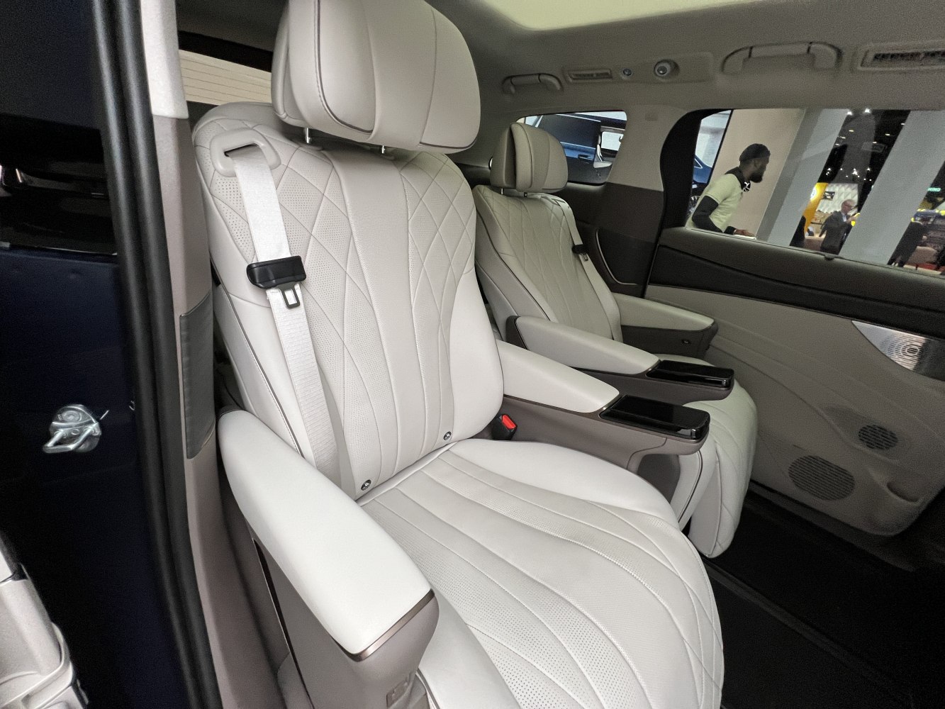 Premium leather interior seats with elegant stitching and armrests