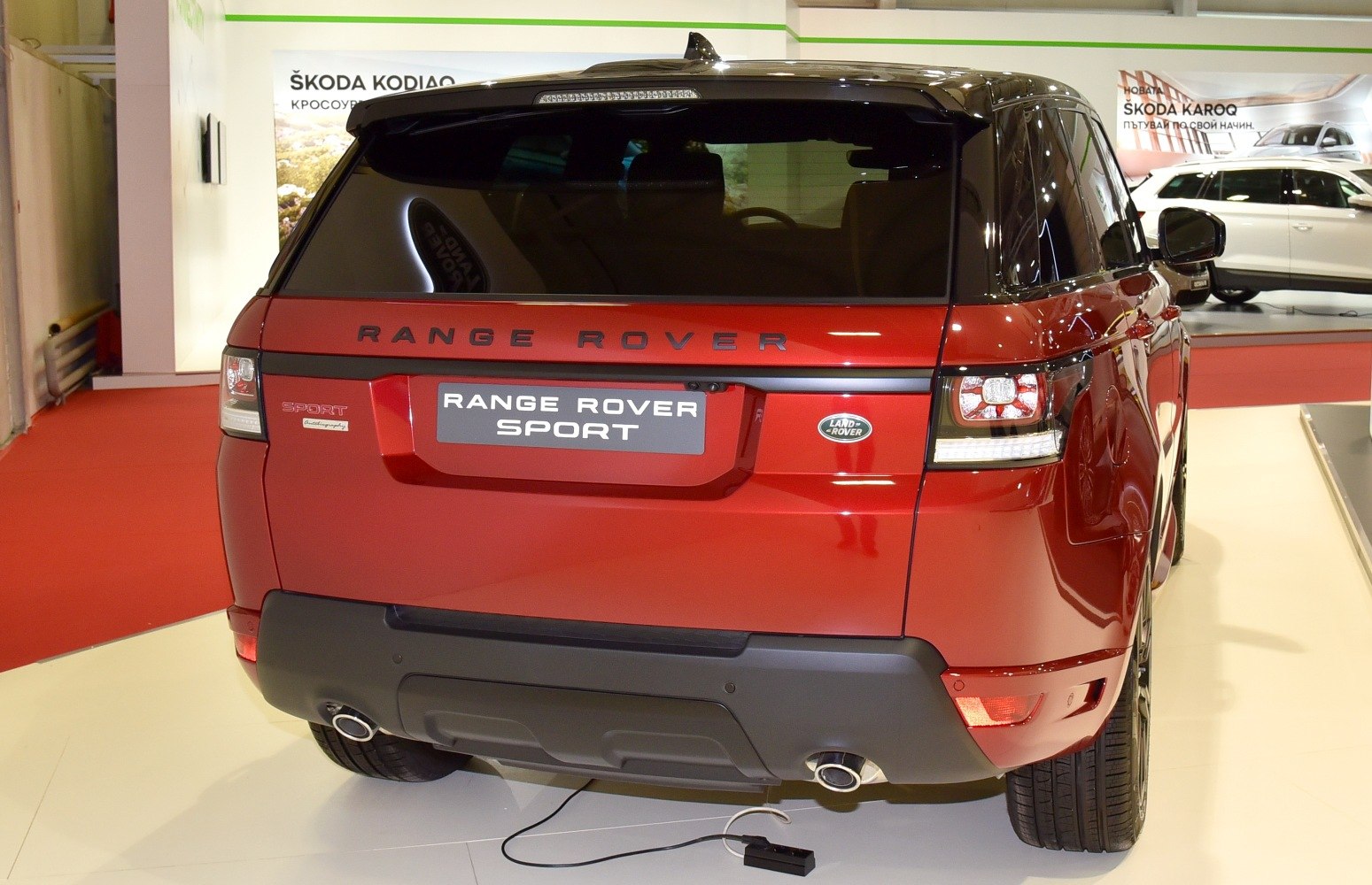 Rear view of SUV with dual exhaust and tinted rear window