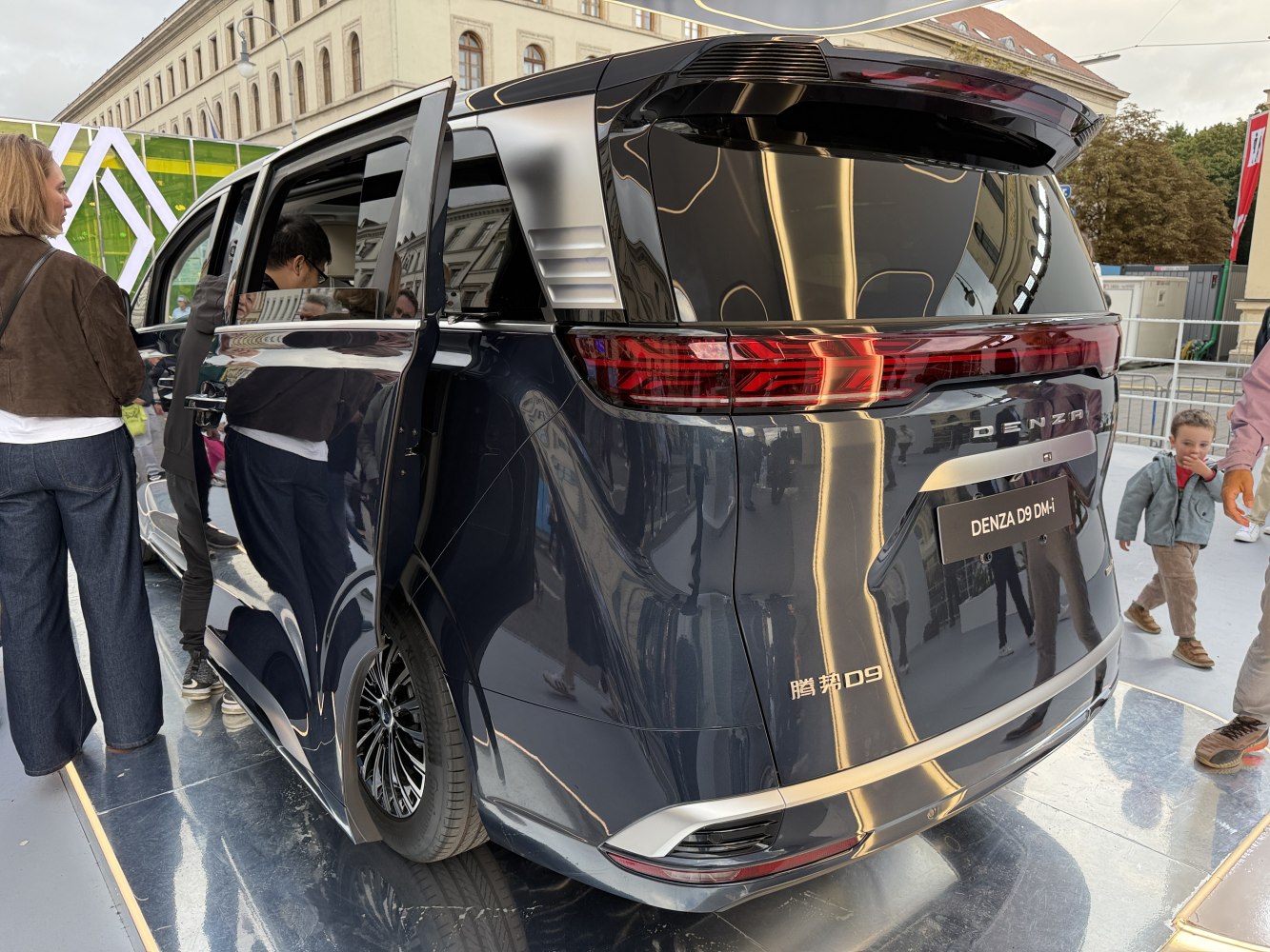 Luxury van rear with sliding door and sleek taillights