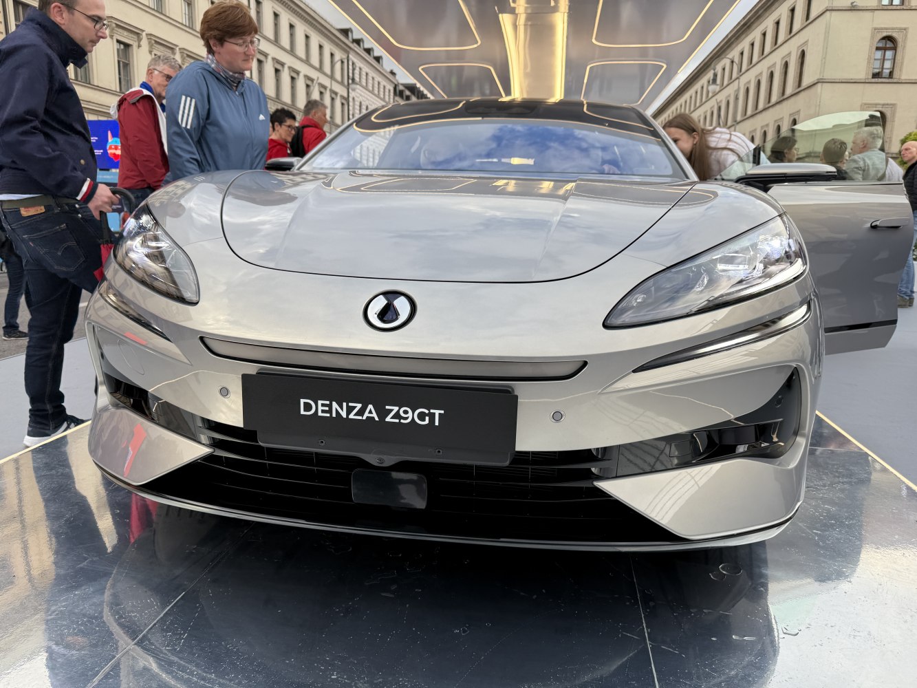 Aerodynamic front with sleek headlights and Denza emblem.