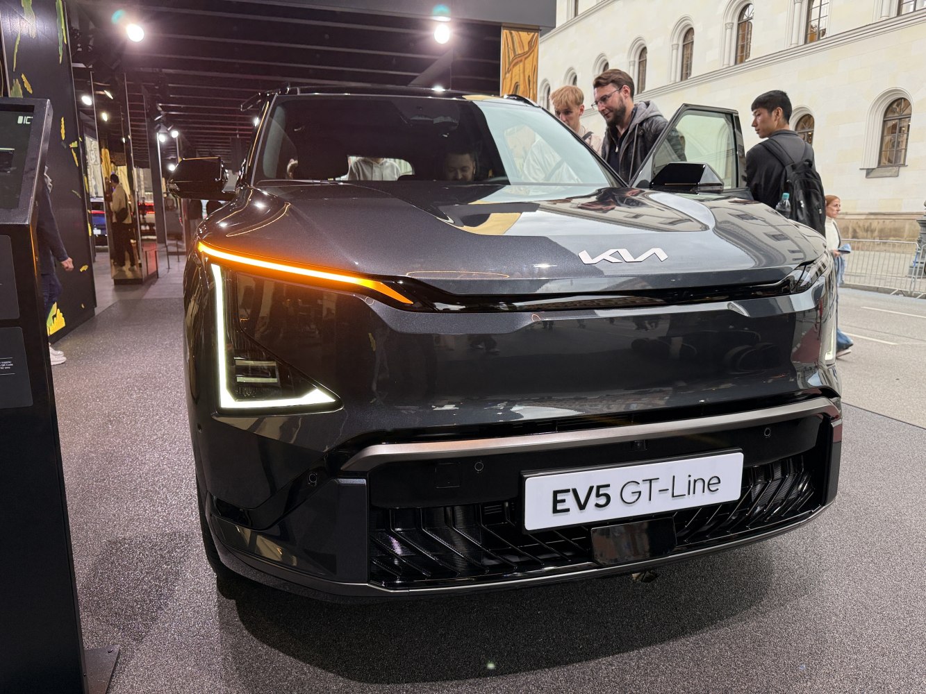 Front view with distinctive LED DRLs and sleek black grille