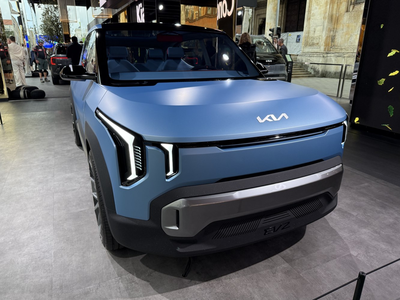Futuristic front LED headlights and modern design on a concept electric vehicle.