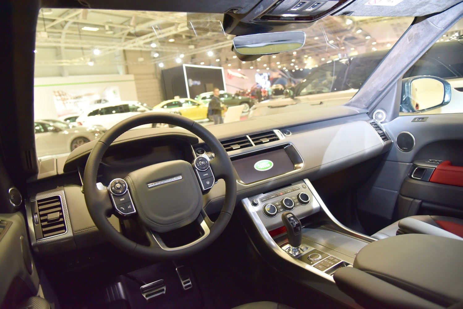 Luxury dashboard and steering wheel with infotainment and control features