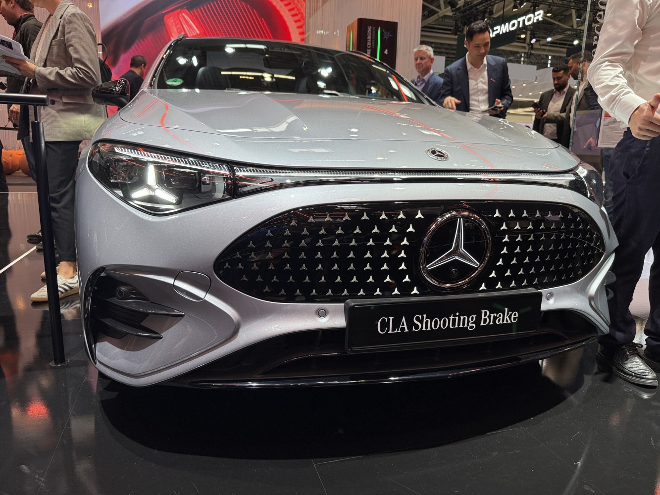 Luxury car front grille and LED headlights close-up