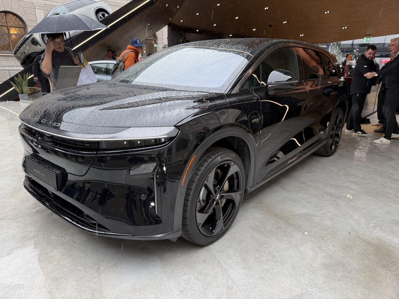 Black luxury SUV with sleek LED headlights and aerodynamic body