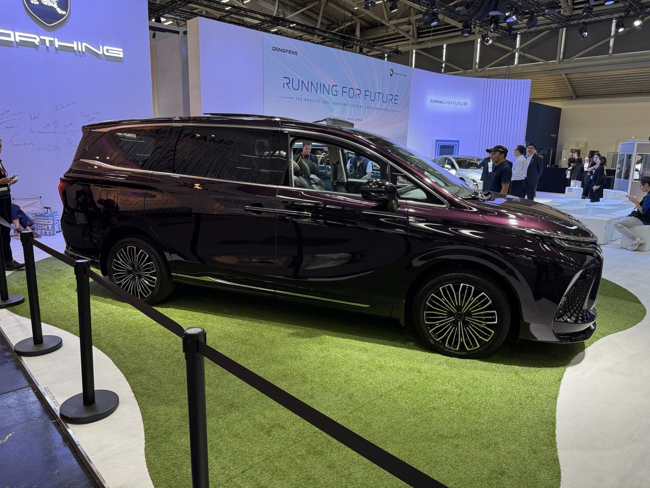 Sleek MPV with aerodynamic design and stylish alloy wheels