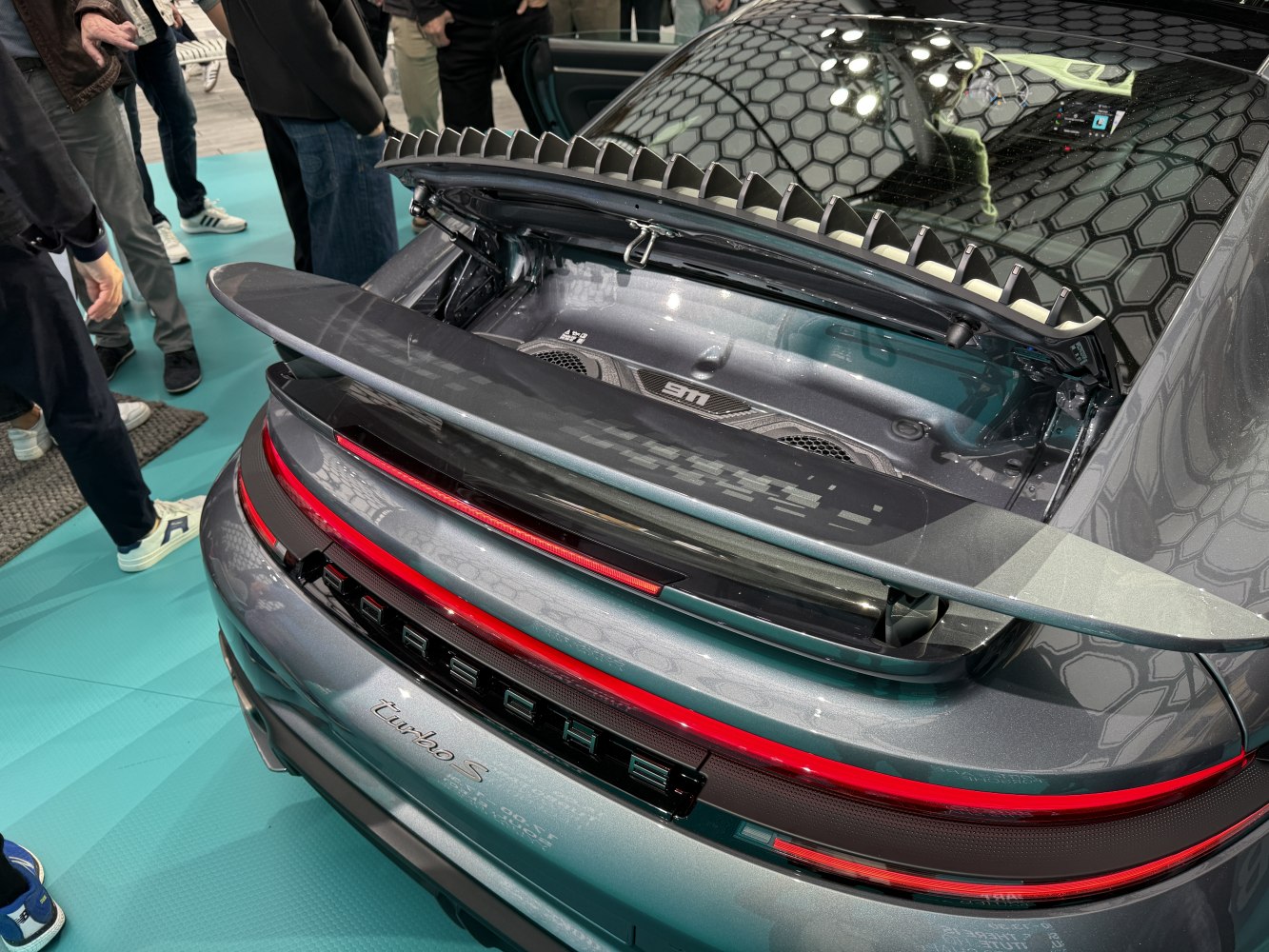 Rear engine compartment and active spoiler of modern sports car