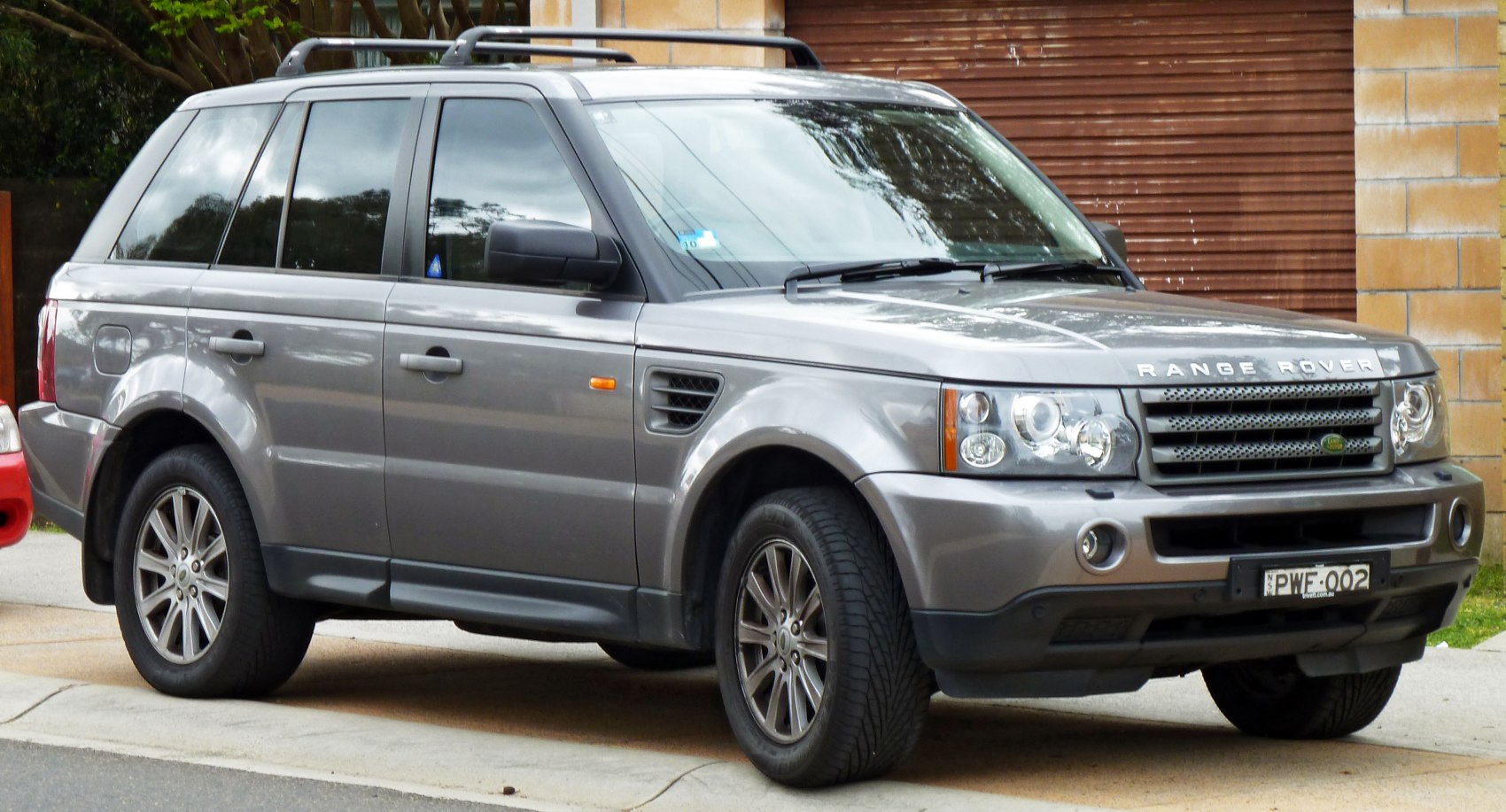 Front and side view of an SUV with distinctive grille and alloy wheels