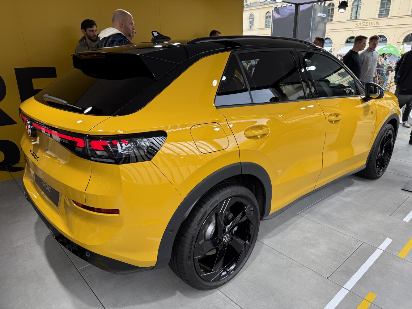 Yellow car with black roof, LED rear lights, and black alloy wheels