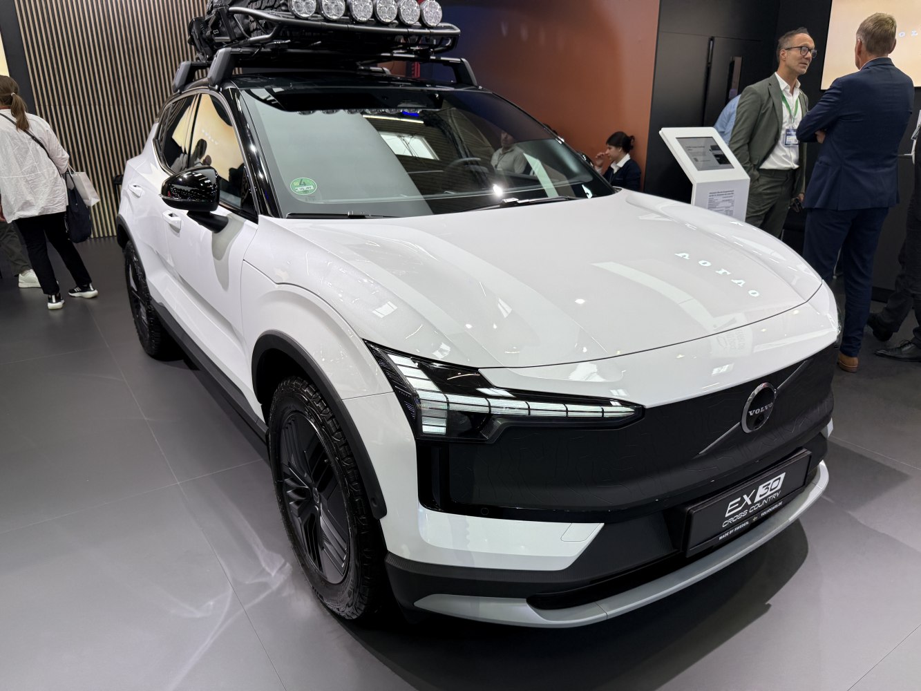 Front view of SUV with roof rack and off-road tires.