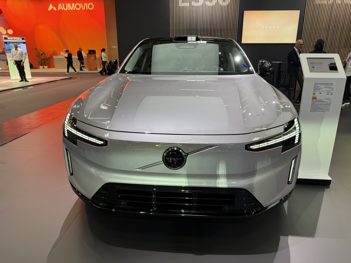 Front view with distinctive LED headlights and modern grille design