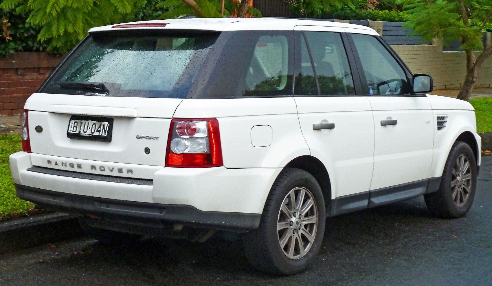 Rear and side view of an SUV with distinct taillights and rugged body design