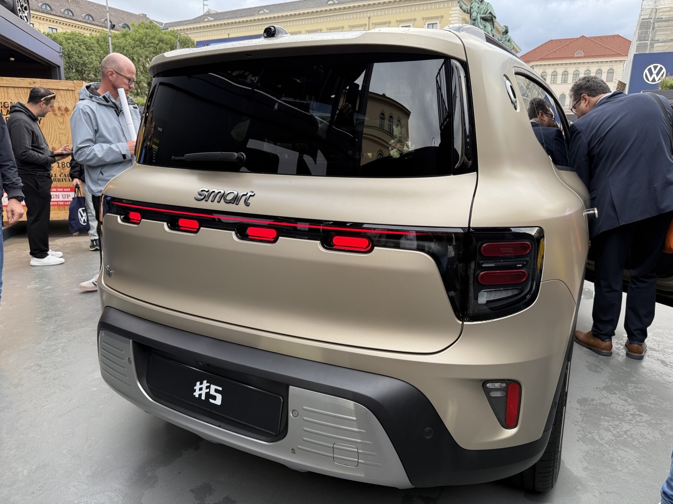 Rear view with distinct LED taillights and hatchback design