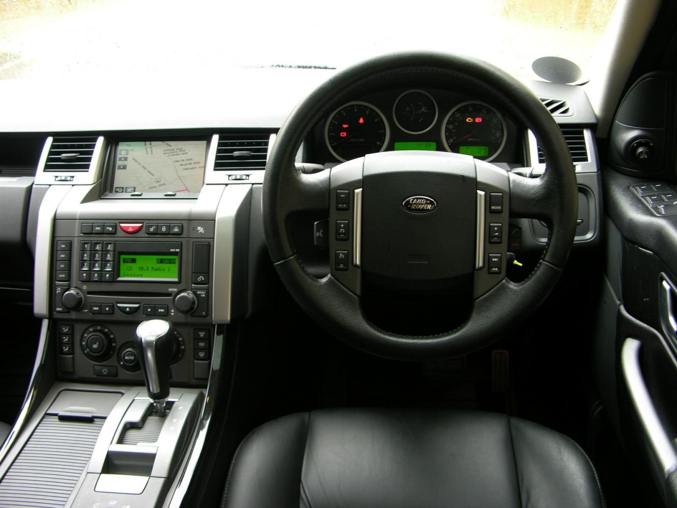 Navigation system and multifunction steering wheel in SUV interior