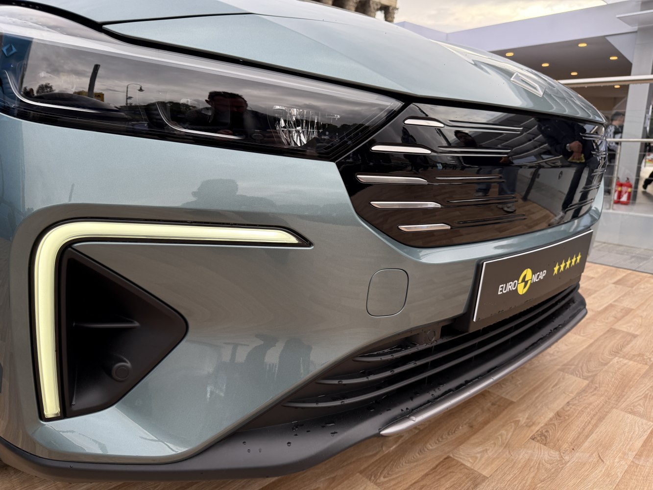 Modern front headlight and grille with LED detailing