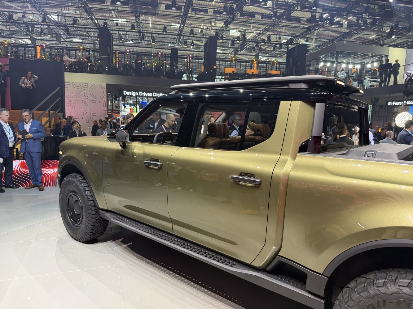 Pickup truck side view with off-road tires and black roof