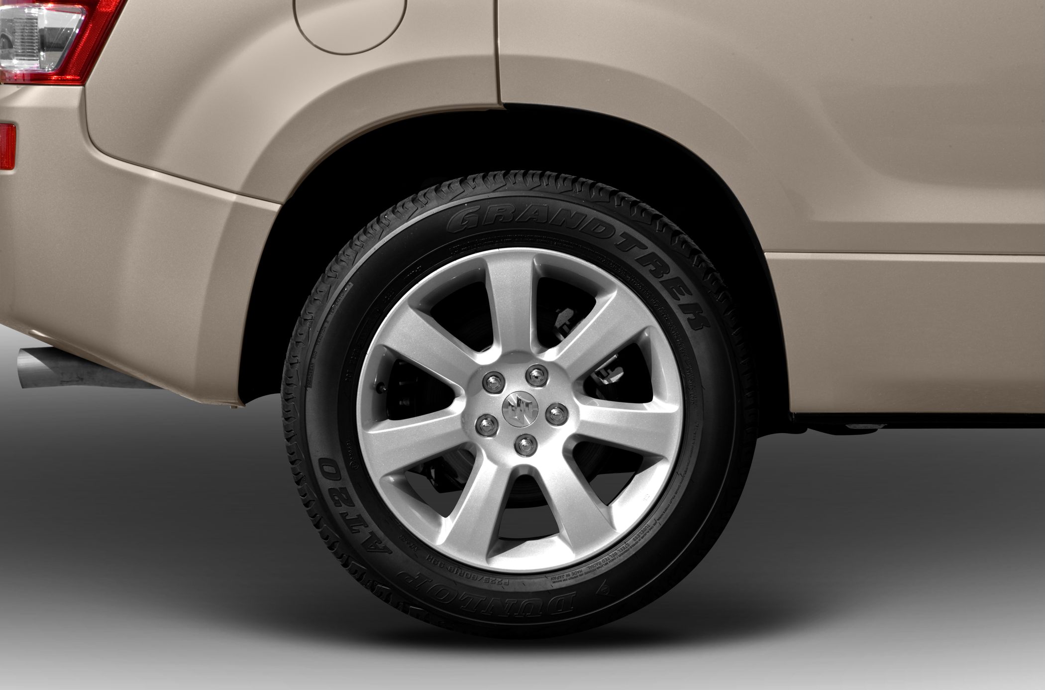 Rear wheel with alloy rim and visible tread on tire