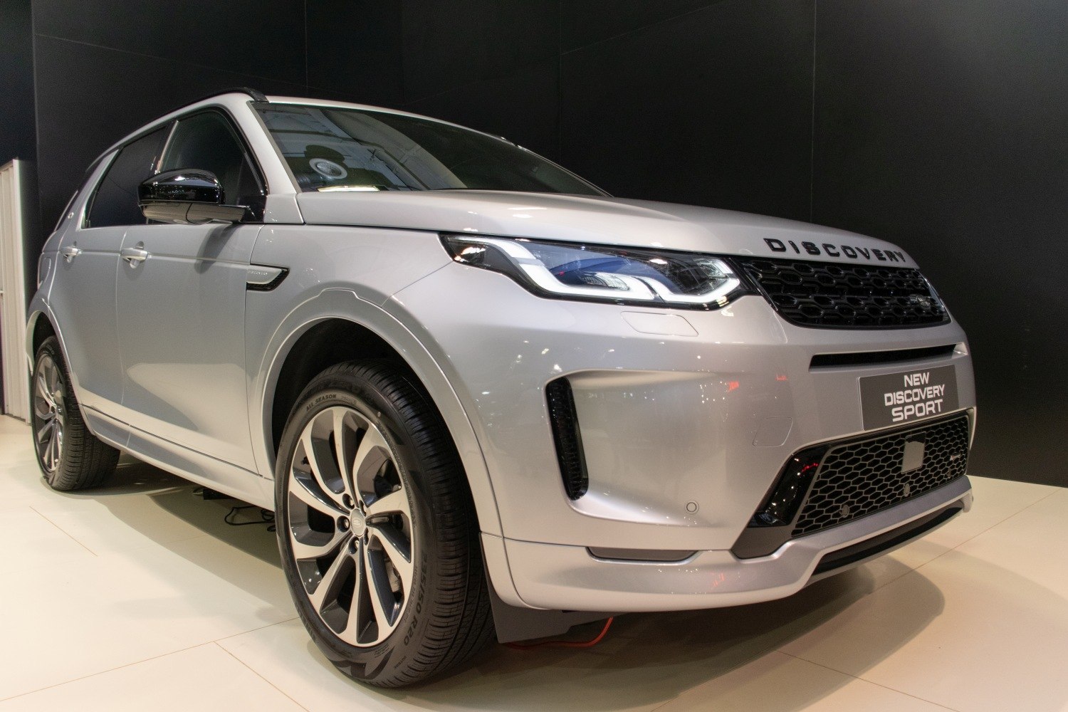 Front and side view of an SUV with LED headlights and alloy wheels