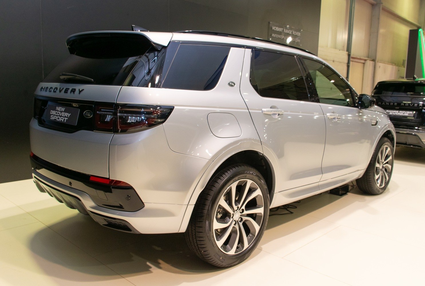 Rear view with tail lights and detailed alloy wheels
