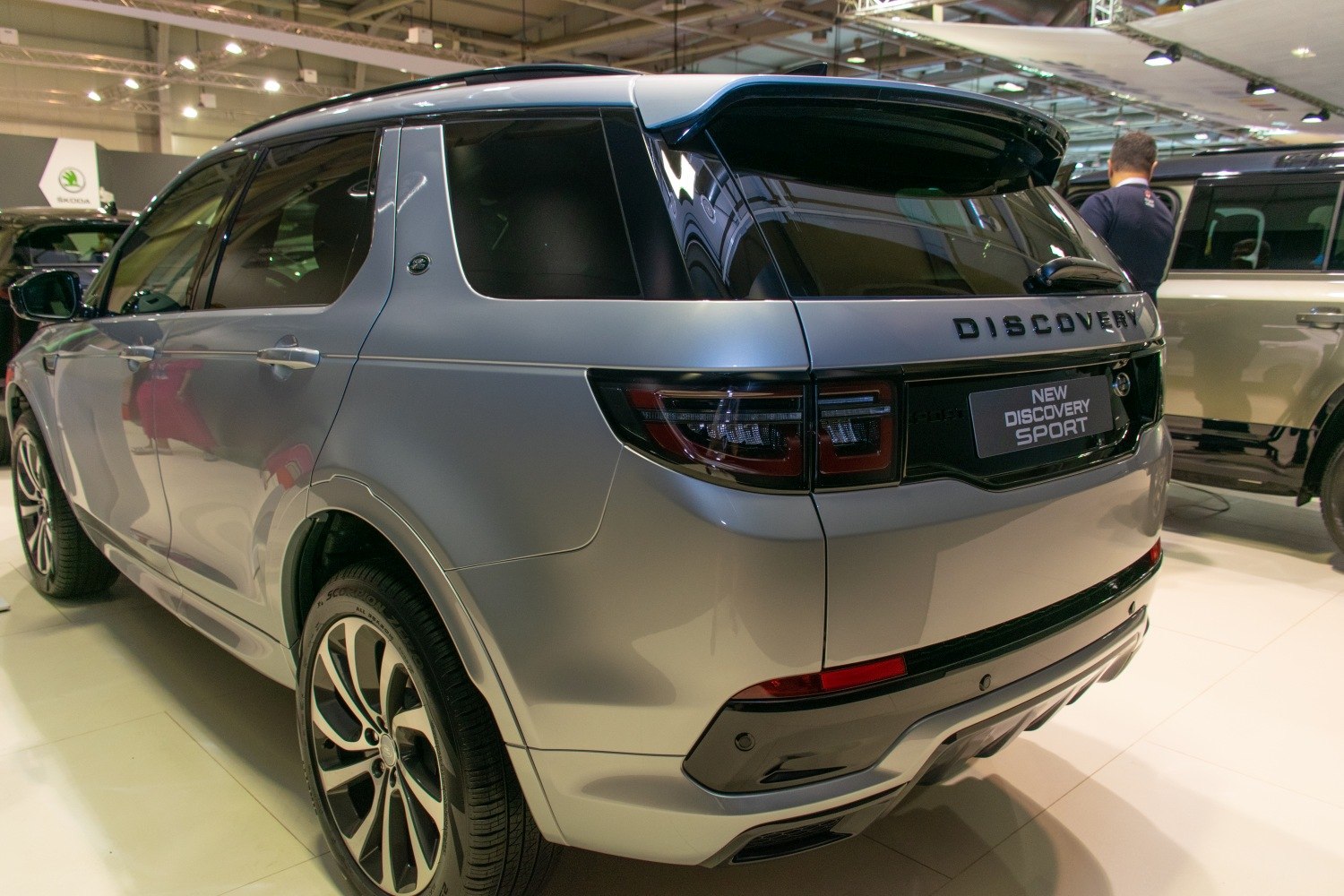 Rear and side view with taillights and alloy wheels in silver finish