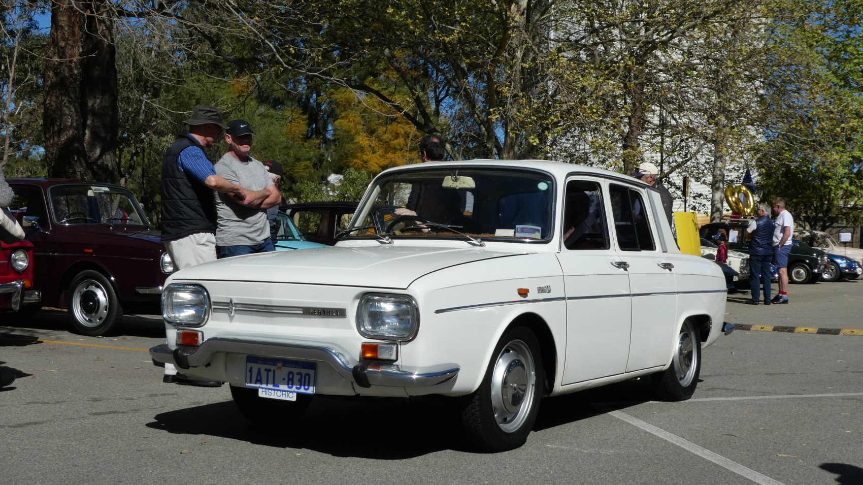 Front view of classic four-door vintage sedan with chrome bumper