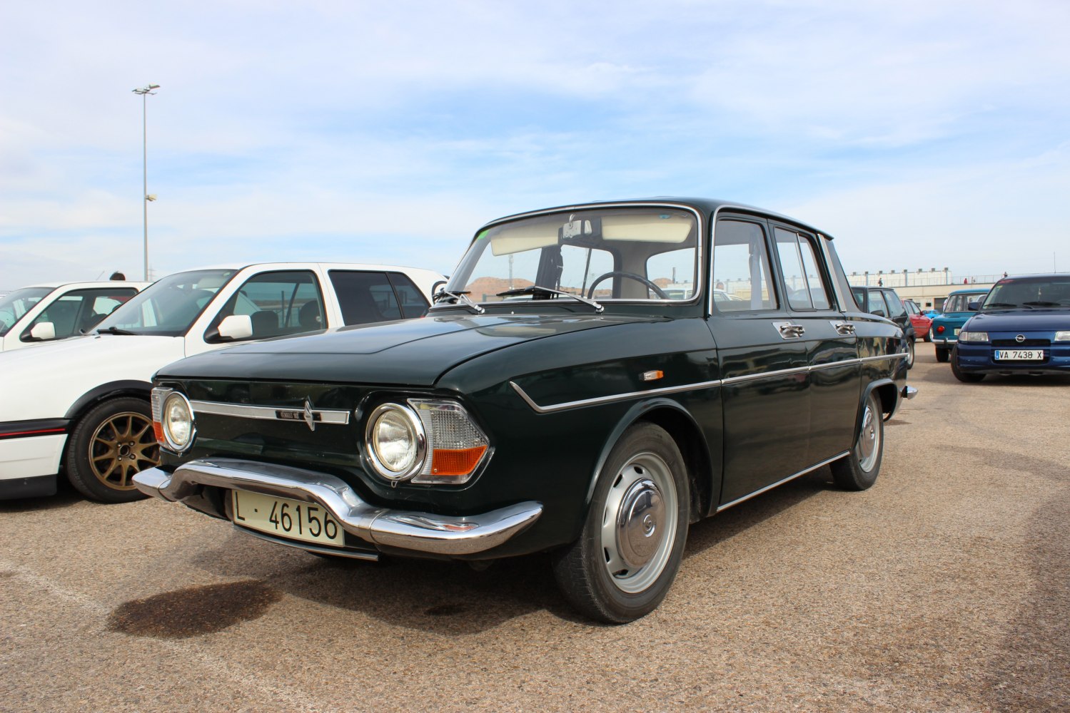 Classic vintage sedan with distinctive front and round headlights