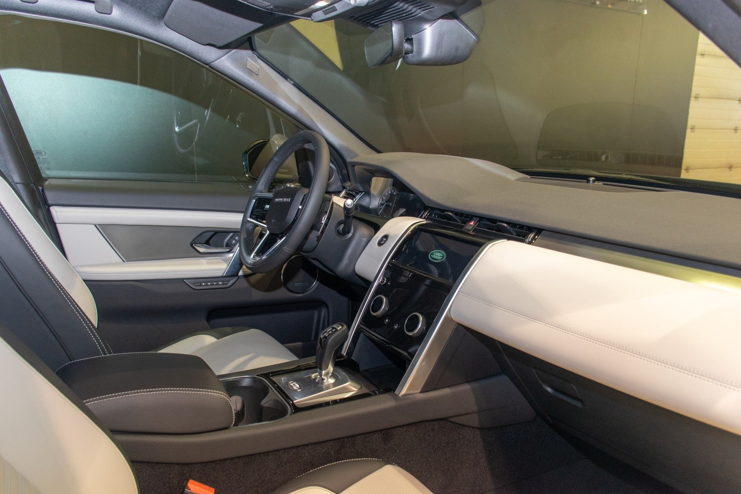 Luxury SUV interior with modern dashboard and touchscreen panel