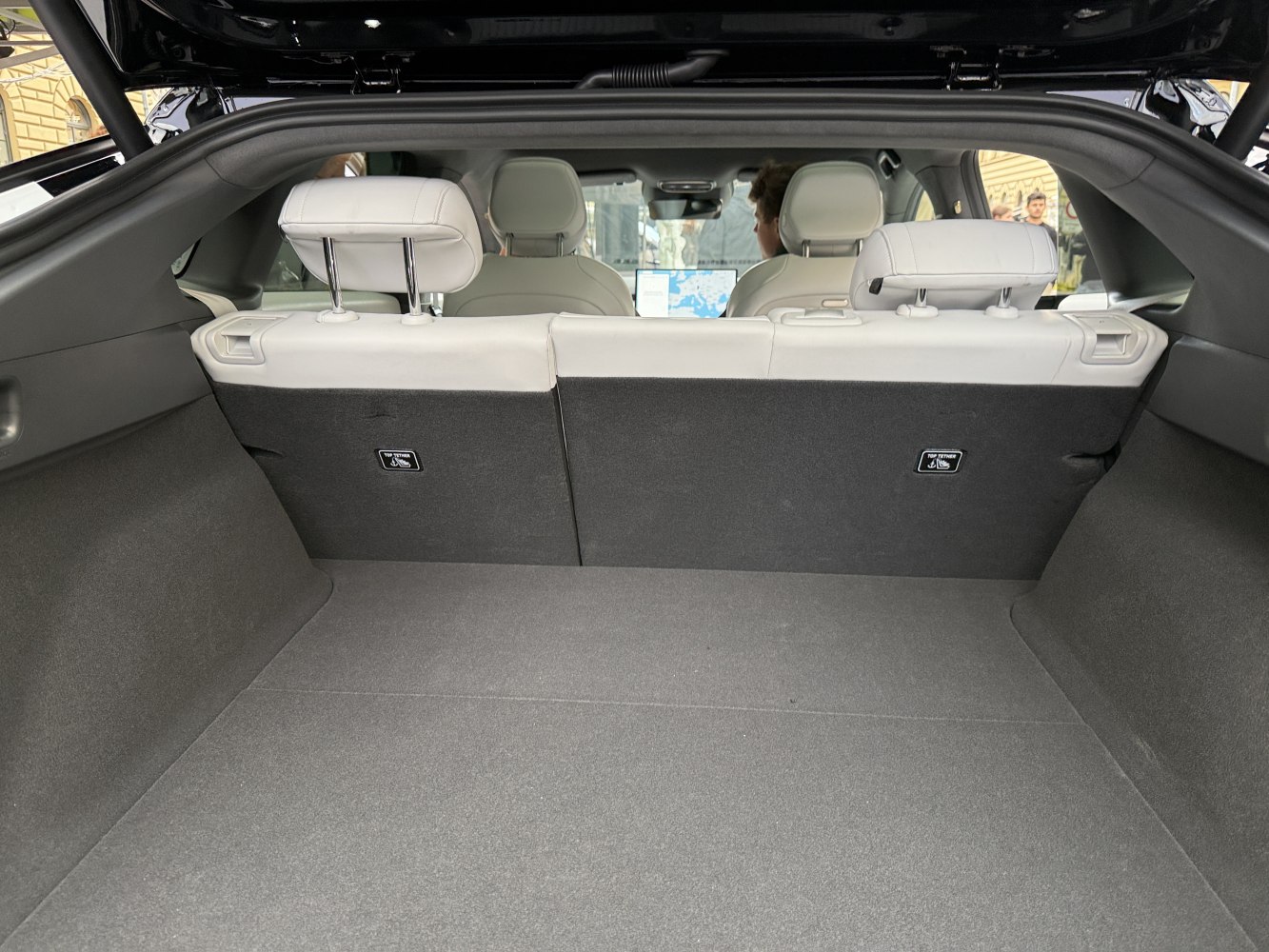 Spacious rear cargo area with white rear seatbacks