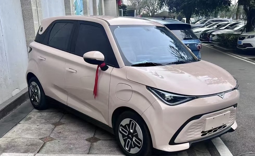 Compact hatchback with sharp LED headlights and smooth body lines