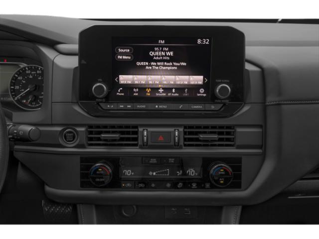Infotainment touchscreen and dual-zone climate control on modern dashboard