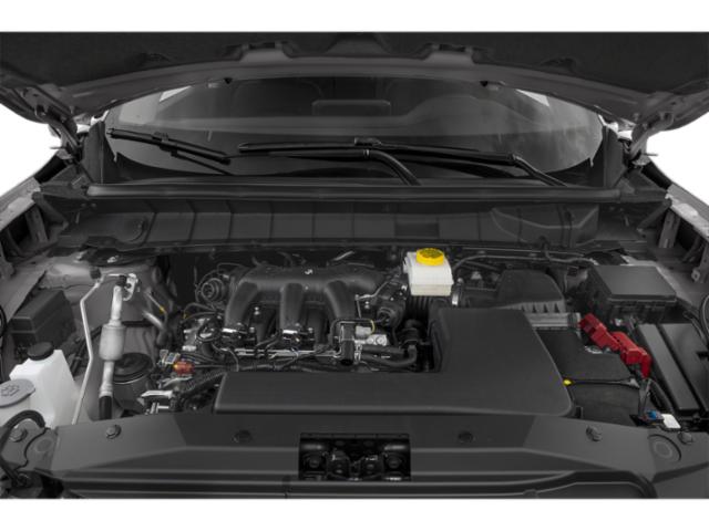 Engine bay with detailed view of components under hood.