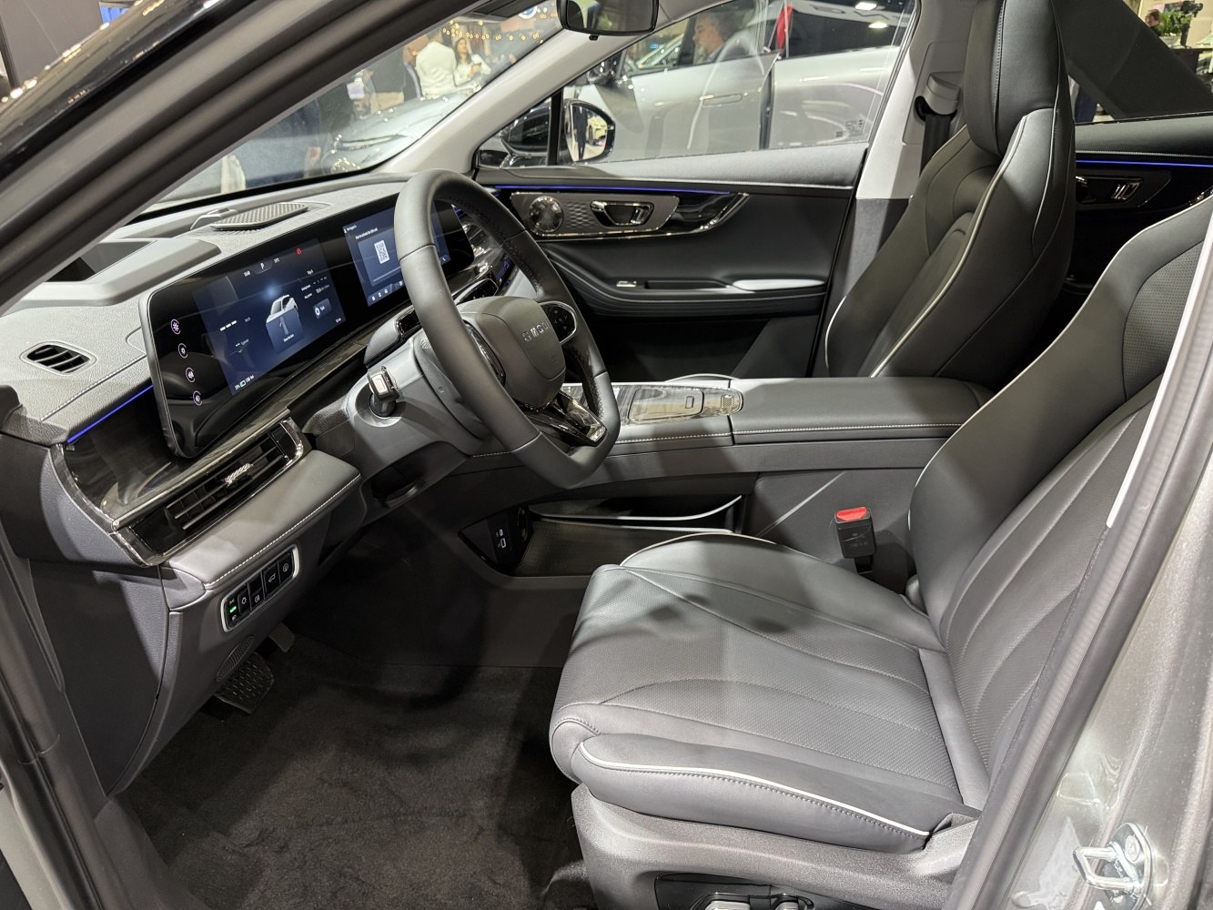 Digital dashboard and leather seats in modern car interior