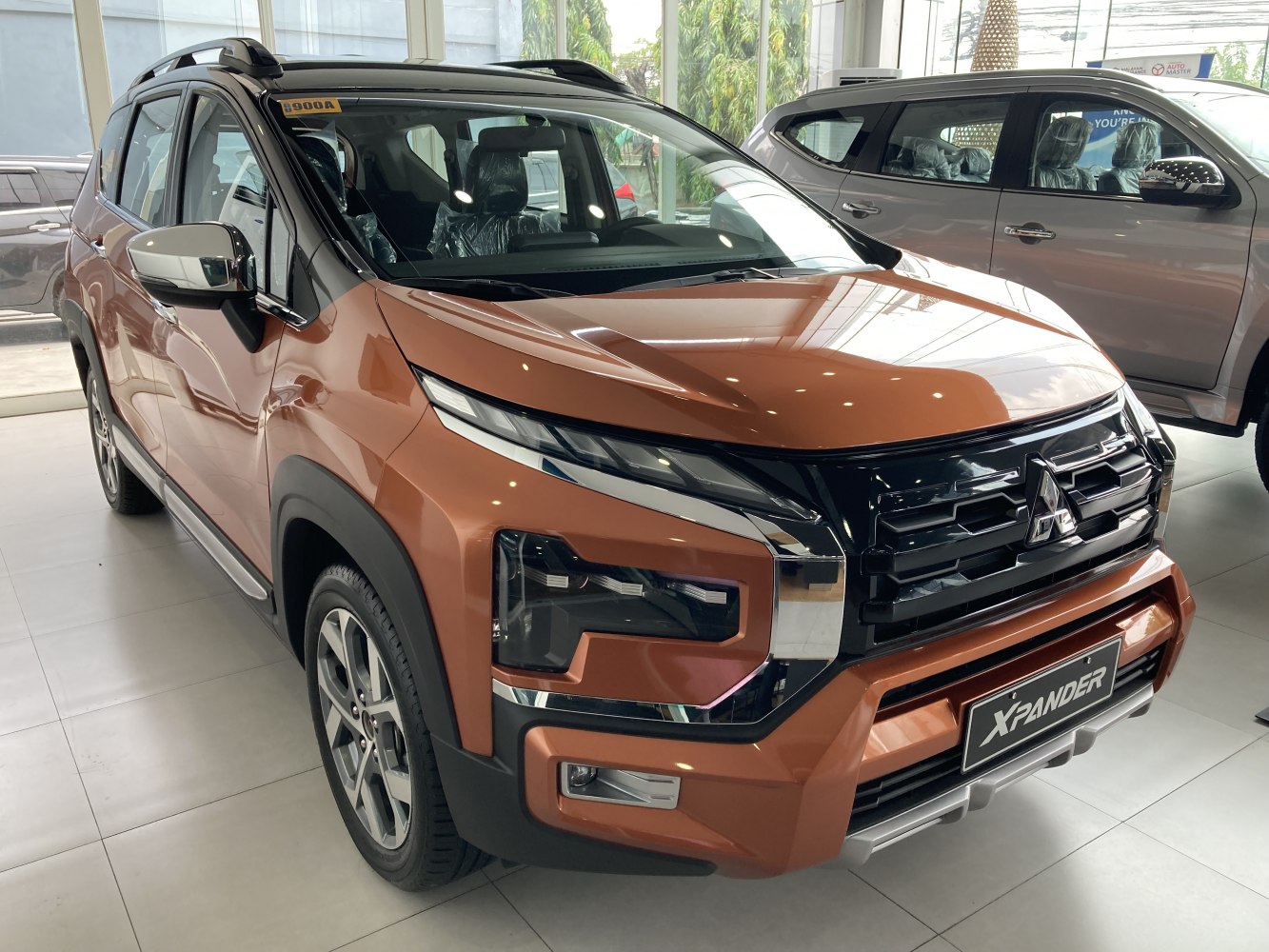Front and side view of a modern SUV with bold grille and LED headlamps