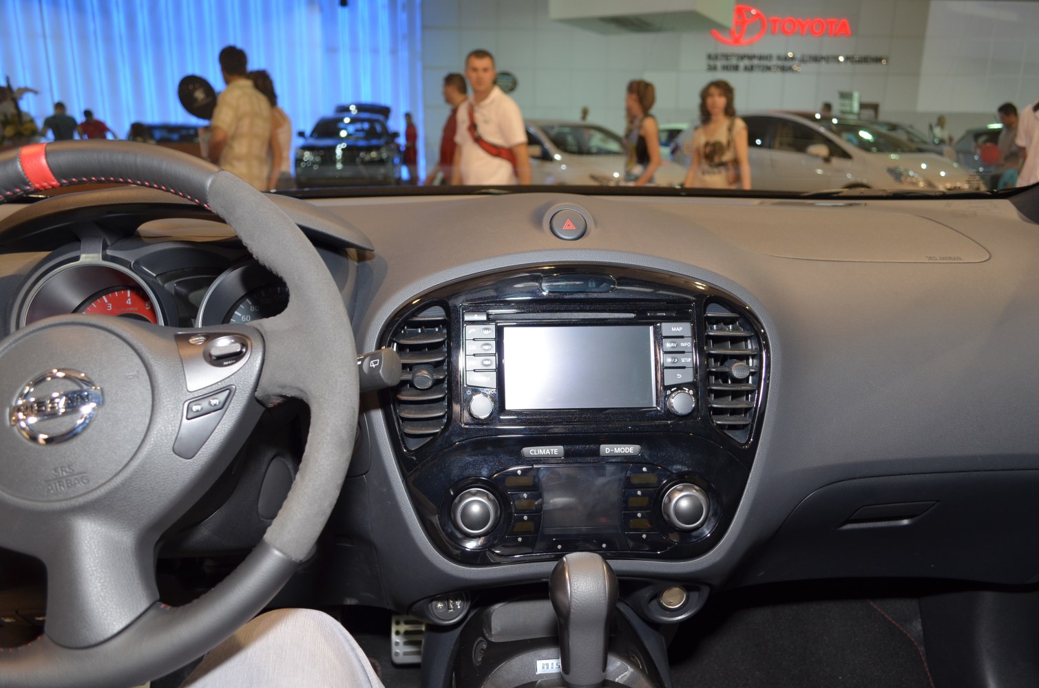 Dashboard and steering wheel with infotainment system and climate control