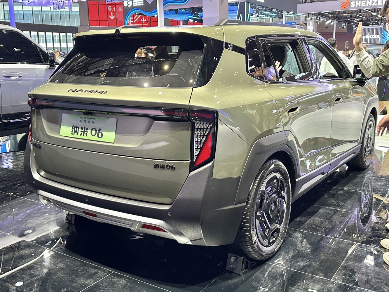 Rear of a modern SUV with geometric sharp tail lights and sleek rear profile
