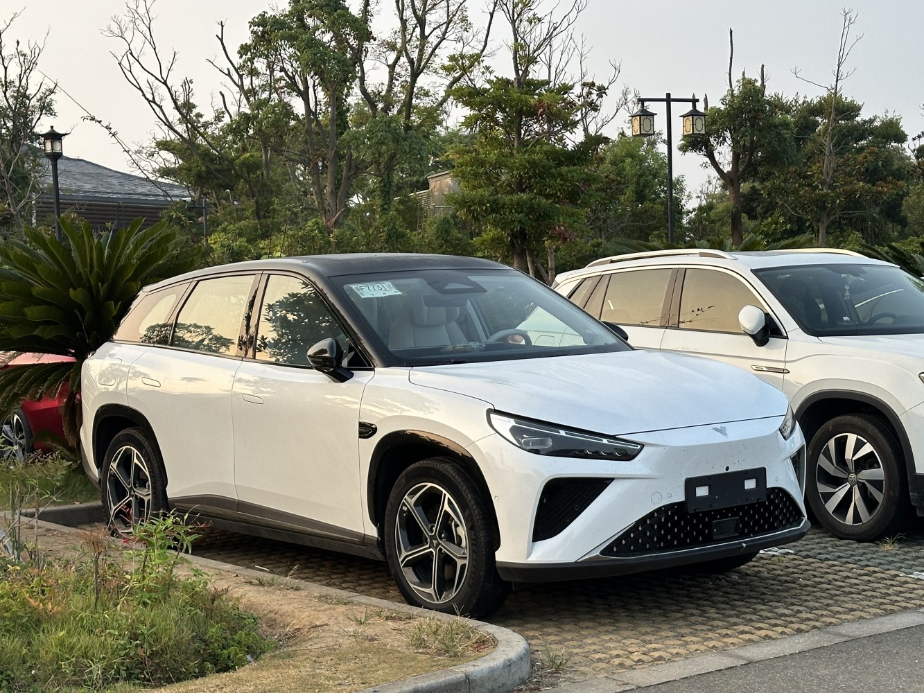 Electric SUV with sleek front fascia and sharp LED headlights