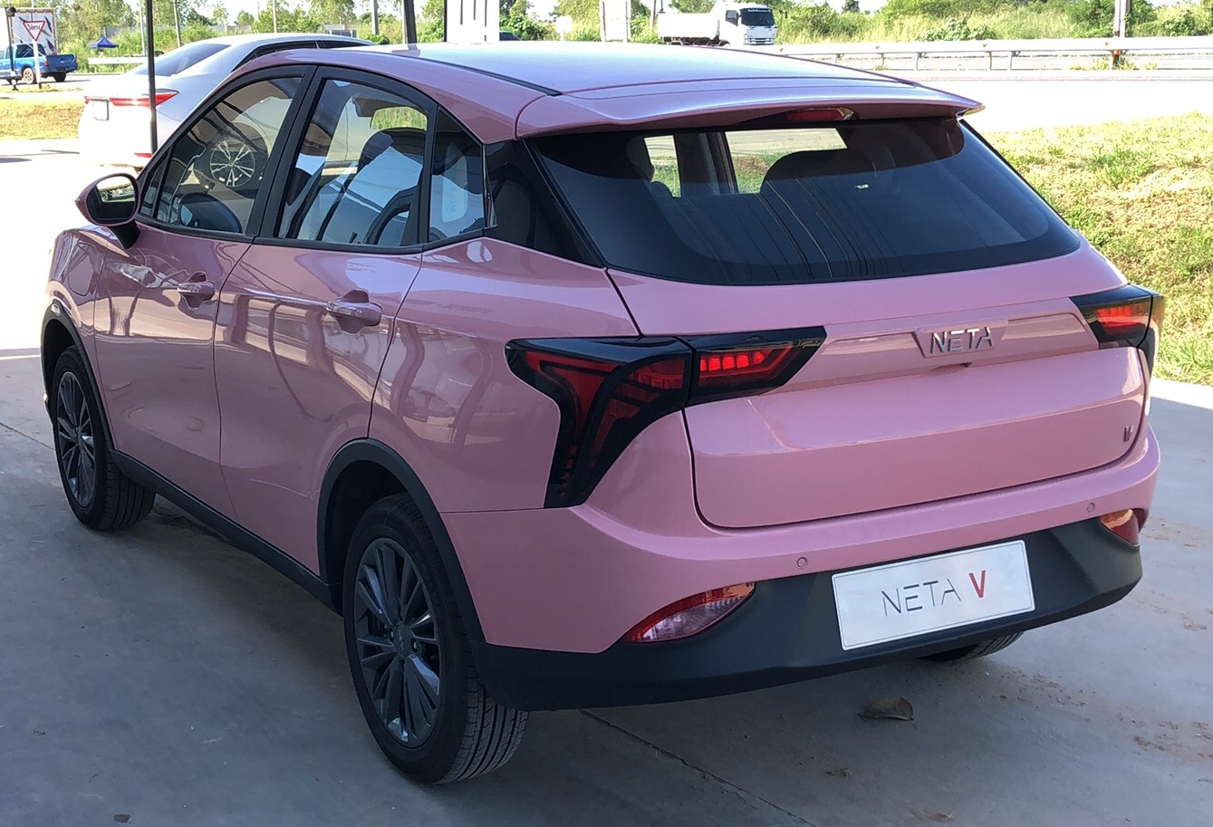 Rear view with angular LED tail lights and hatchback design