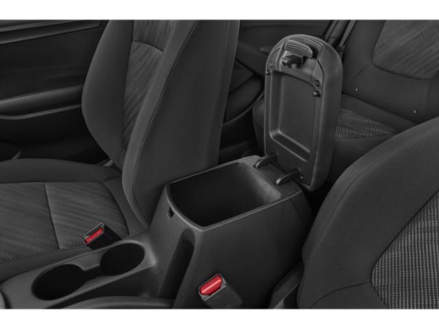 Center console storage compartment and cup holders inside car interior